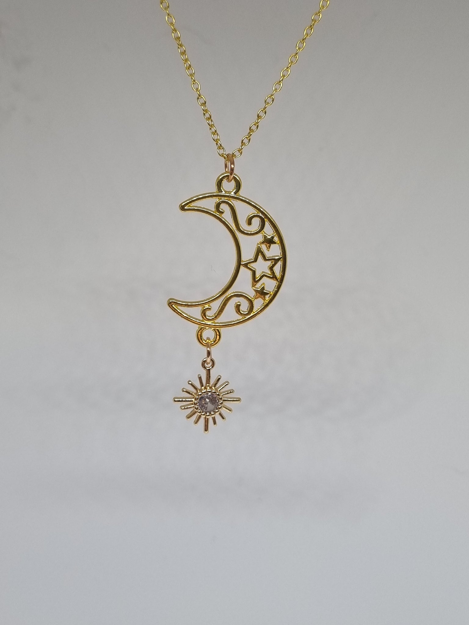 Moon and sun necklace